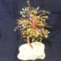 albero di rame realizzato con i fili di rame di un cavo elettrico