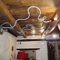 lampadario applique a rami con tubi